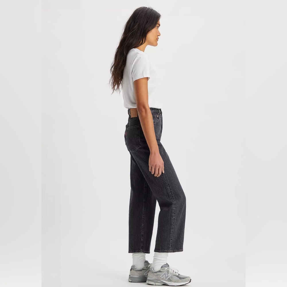Levi’s Ribcage Straight Ankle, size 24. Black Denim. Cut at bottom hem